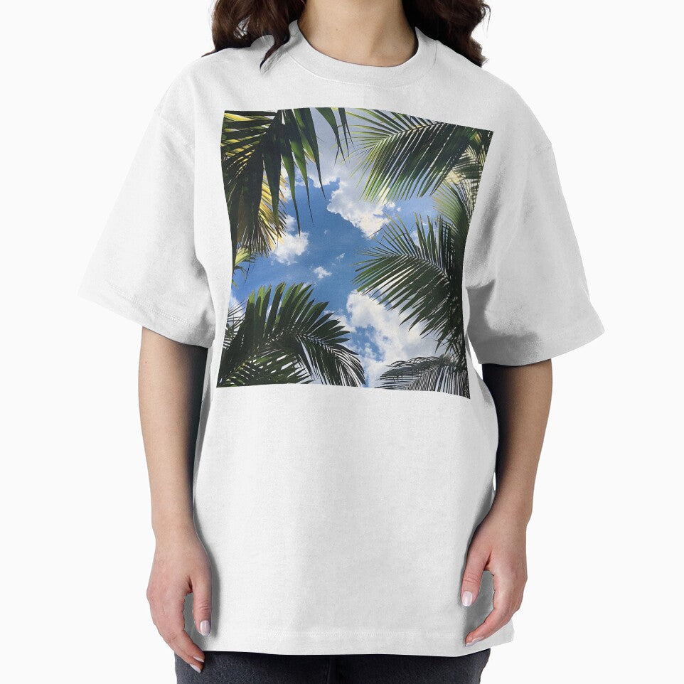 tropical view of blue sky and palm trees by dcrc
