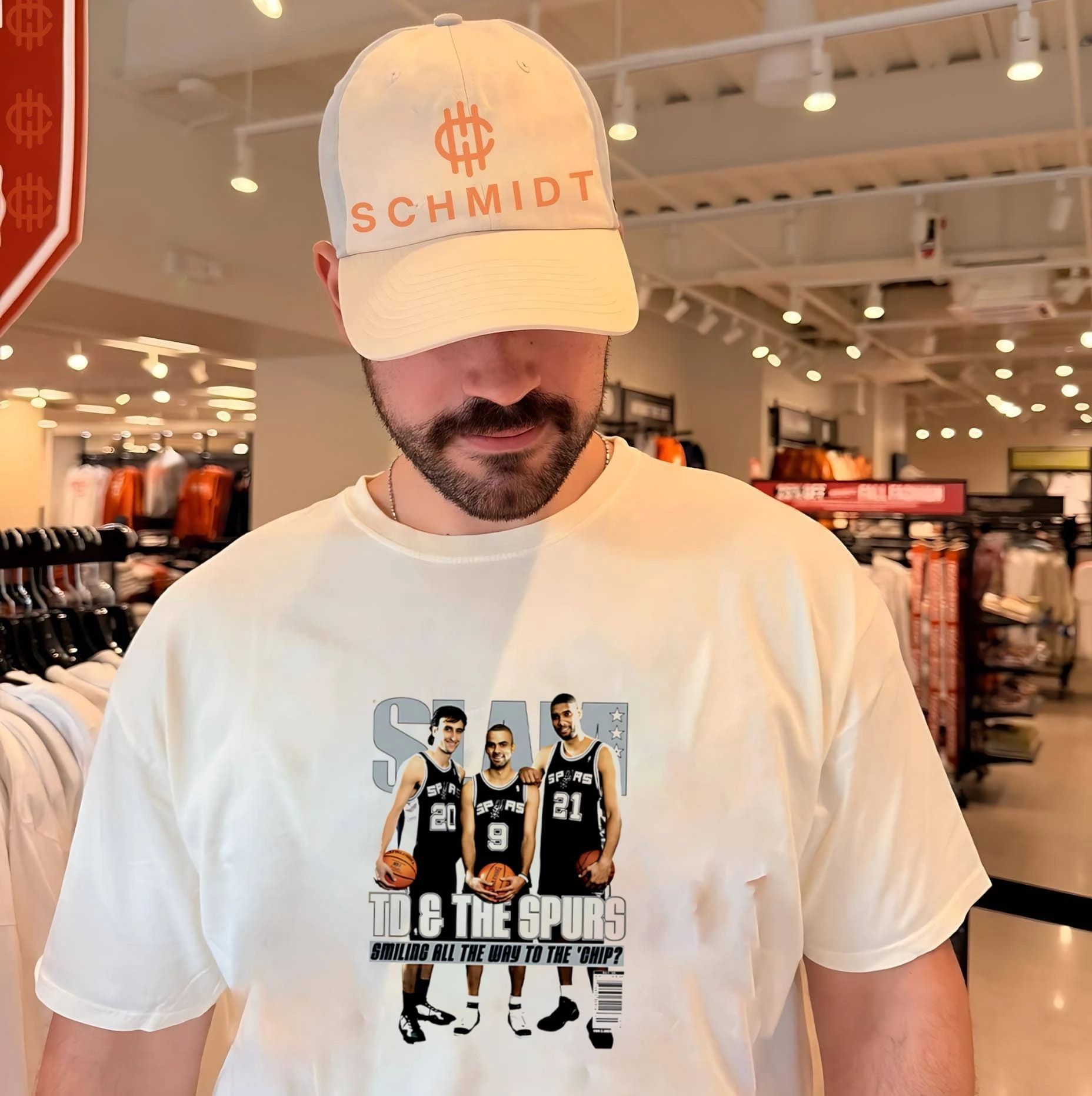 San Antonio Spurs TD and The Spur smiling all the way to the chip shirt