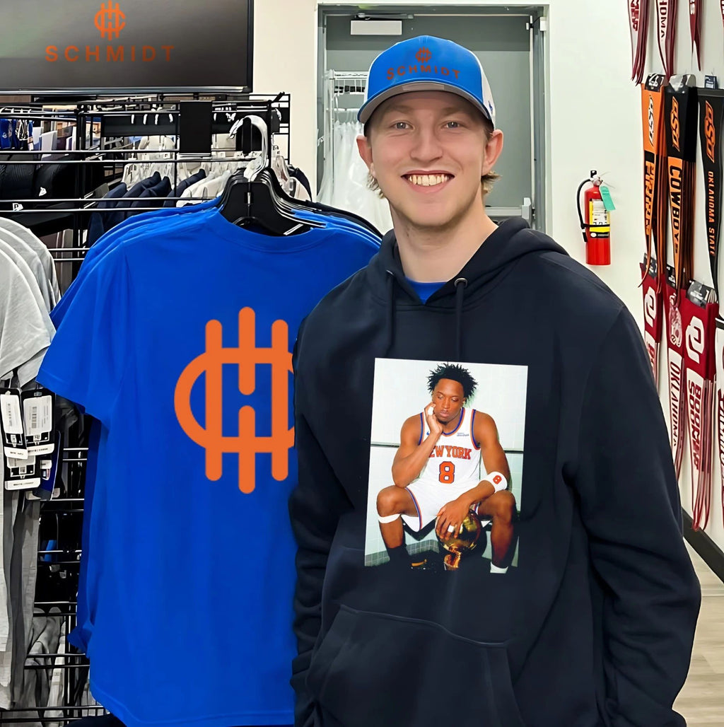 New York Knicks OG Anunoby sitting with trophy shirt
